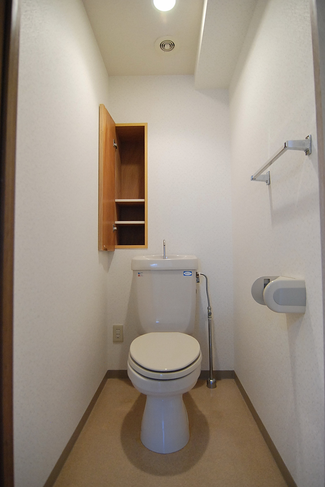 Toilet. With storage shelf Warm water washing toilet seat can also be attached.