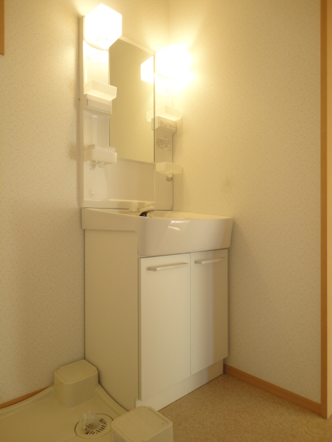 Washroom. It is a wash basin with cleanliness with lighting