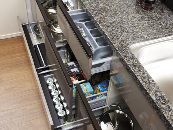 Kitchen.  [System kitchen storage] Be taken out easily sliding storage thing back. It mitigates the impact at the time of opening and closing with a soft close function.