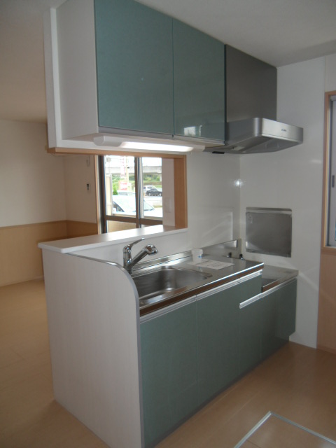 Kitchen. Popular counter kitchen ・ Living room overlooks