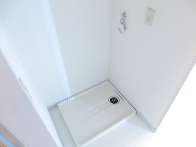 Other Equipment. Washing machine in the room