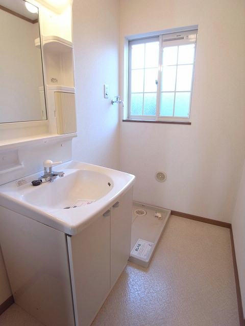 Other. Bright basin dressing room there is a window