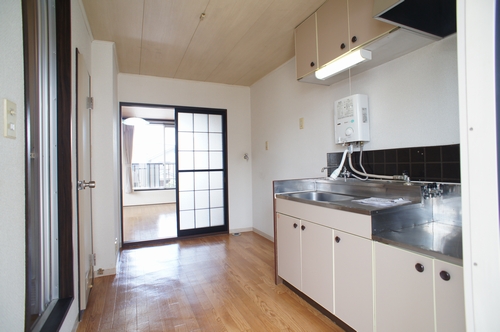 Kitchen. It is a photograph of another room.