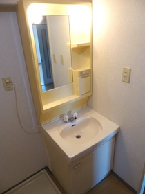 Washroom. Bathroom vanity ☆ Washing machine in the room