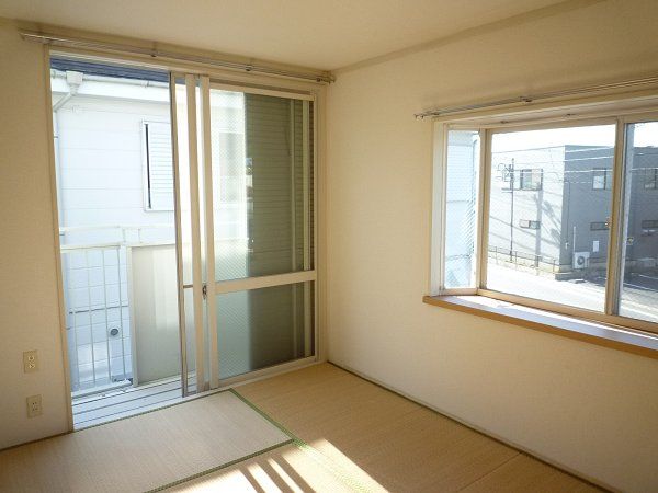 Living and room. It is a photograph of another room