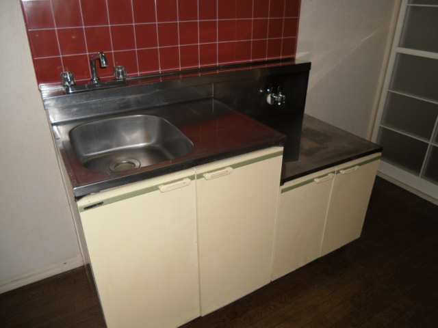Kitchen. It is fashionable red tile