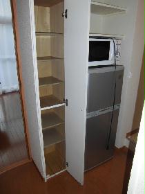 Living and room. refrigerator, microwave