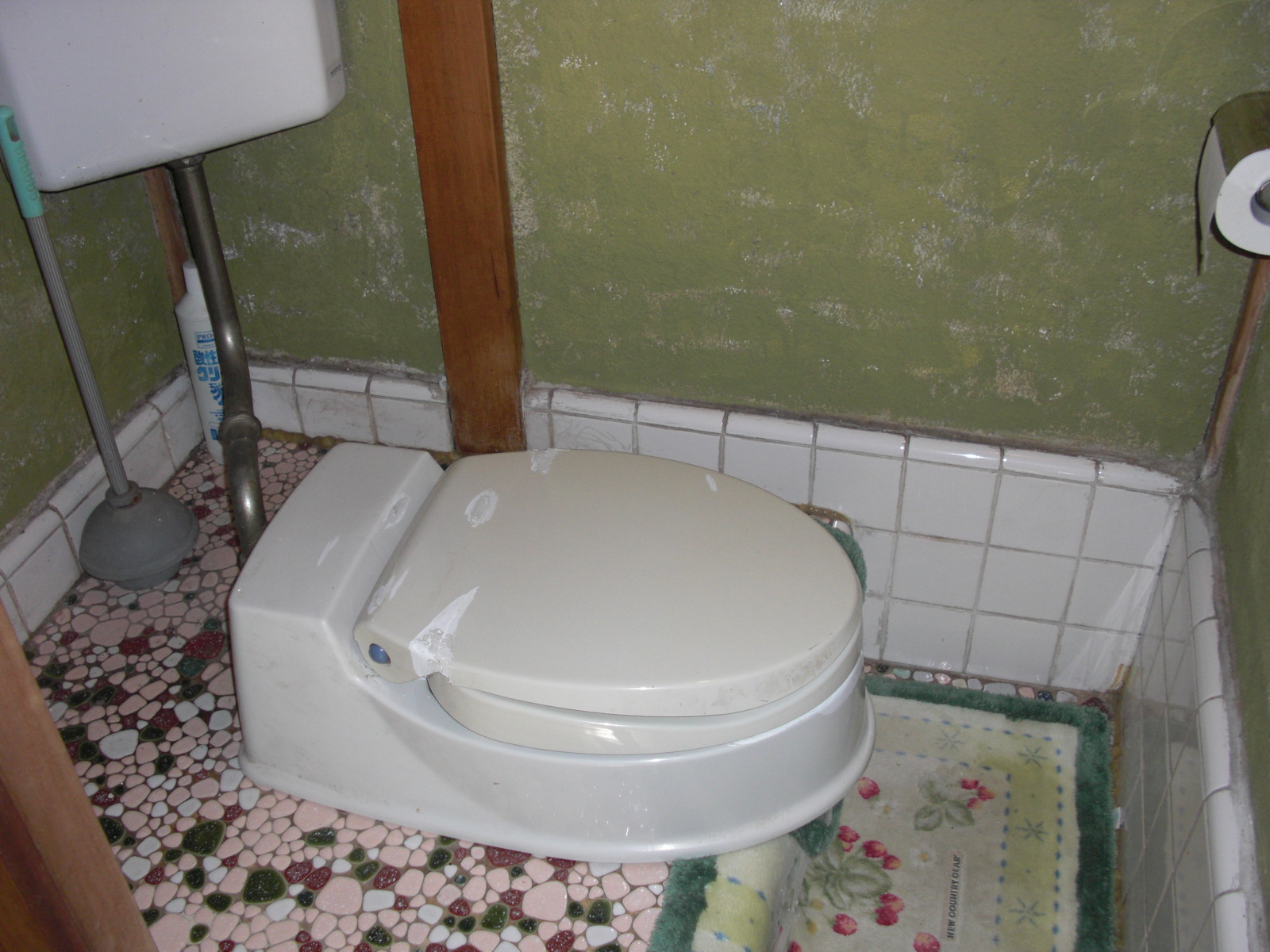 Toilet. It is out of tile is good taste! 