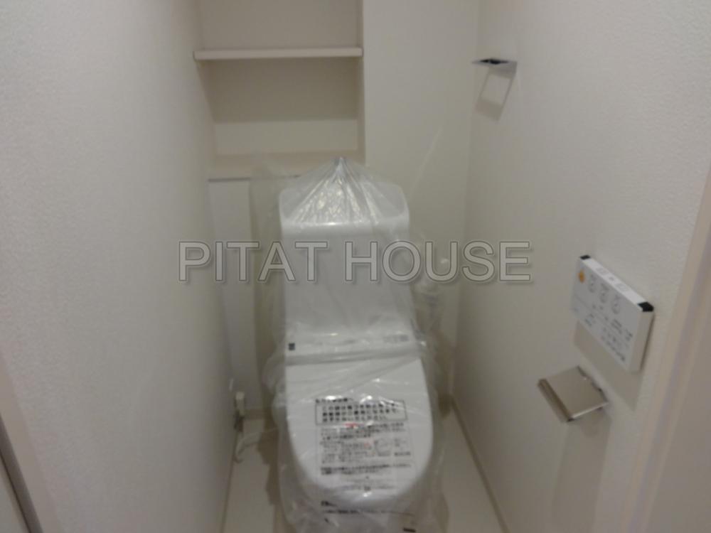 Toilet.  [toilet] Bidet with a new toilet