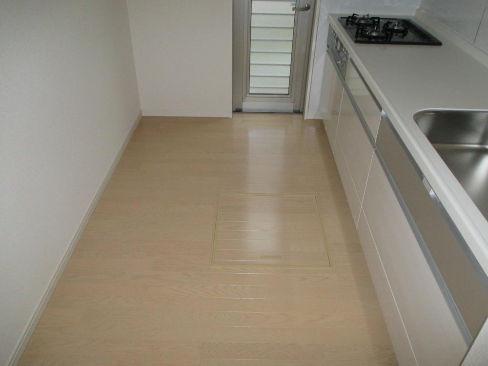 Kitchen. Convenient back door to Gomidashi