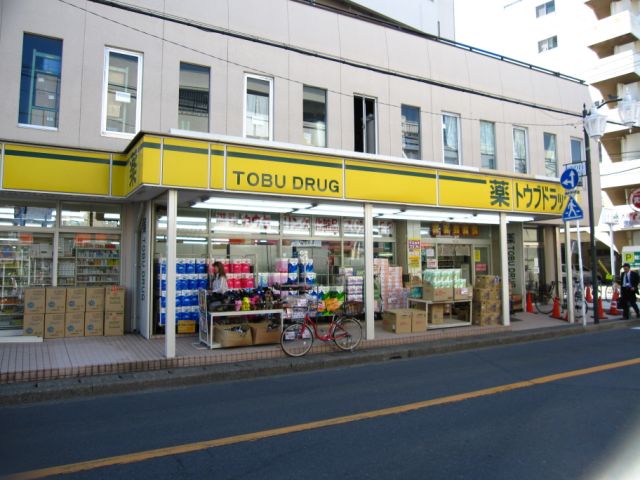 Dorakkusutoa. Eastern 380m to drag (drugstore)