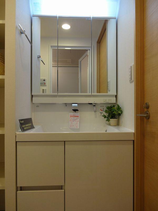 Wash basin, toilet. Bathroom vanity