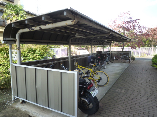 Kitchen. There are bicycle parking lot with a roof