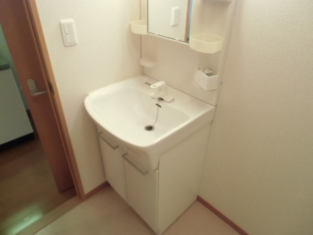 Washroom. With separate wash basin