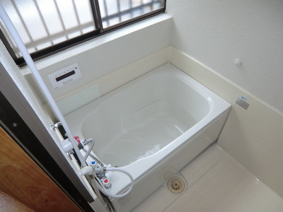 Bath. Bright bathroom of with window Reheating hot water bath new