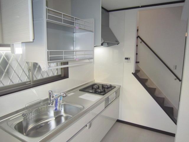 Kitchen. It is a handy kitchen with a drop storage. Storage door is a sliding, Storage capacity up