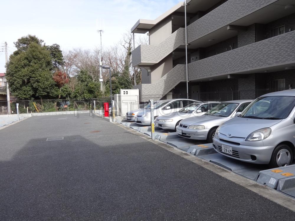 Parking lot.  [Parking Lot] Parking is also a breeze in the parking lot also spacious spaces on-site
