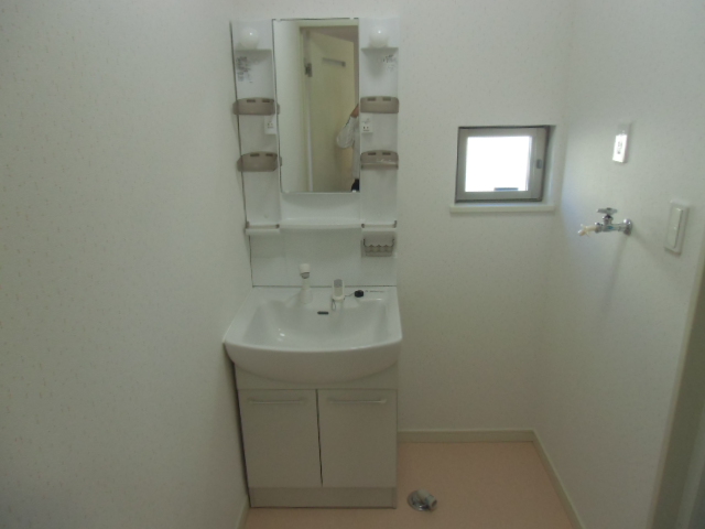 Washroom. Place for washing machine inside the room and the bathroom vanity, Shampoo with Dresser