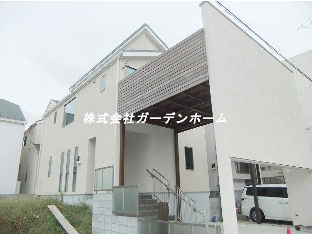 Local appearance photo. New mansion nestled in a quiet residential area