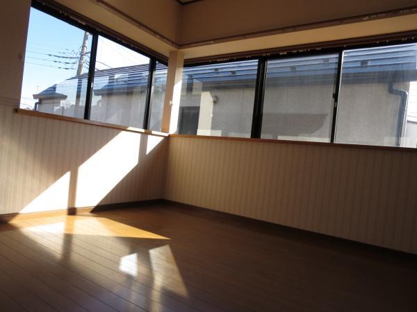 Bathroom. There is a window large windows in the bath.
