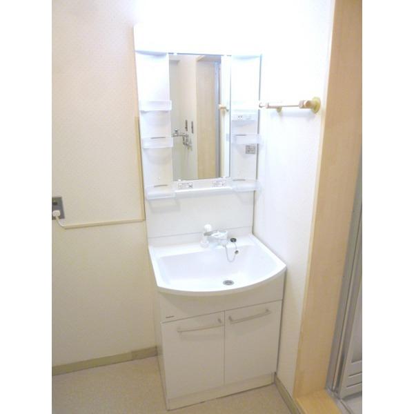 Wash basin, toilet. Vanity also new mounting