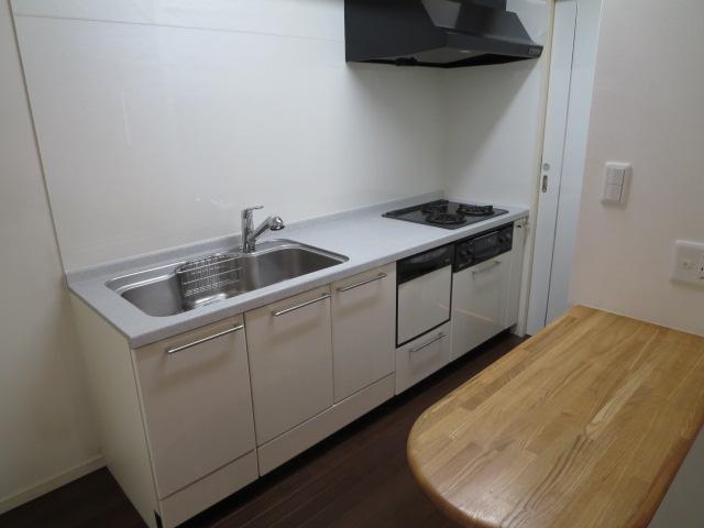 Kitchen. Because there is almost no unobstructed to living, Is smooth carry the dishes Also help the child to use the counter!