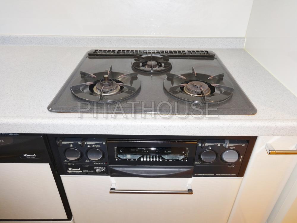 Kitchen.  [Stove] Easy-to-use 3-burner stove. You can significantly reduce the time of cooking.
