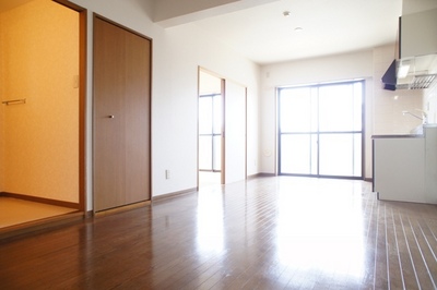 Living and room. A bright room facing the balcony