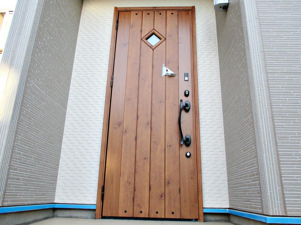 Entrance. Pomp and Circumstance wood entrance door