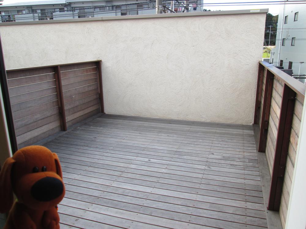 Balcony. Wood deck-style veranda, It is wide