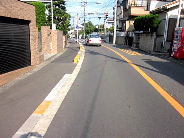 Local photos, including front road. Front road is 8m public road with a sidewalk