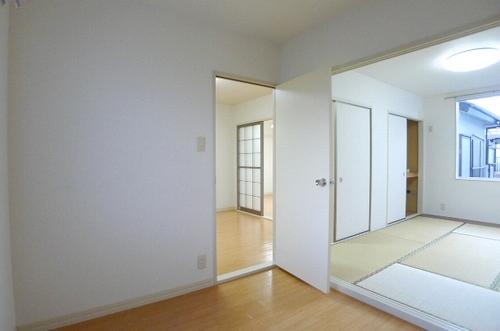 Other room space. It is a photograph of the 202 in Room