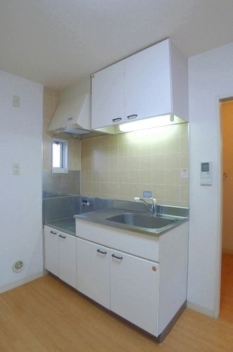 Kitchen. Bright kitchen there is a window in the kitchen! It is a photograph of the 202 in Room