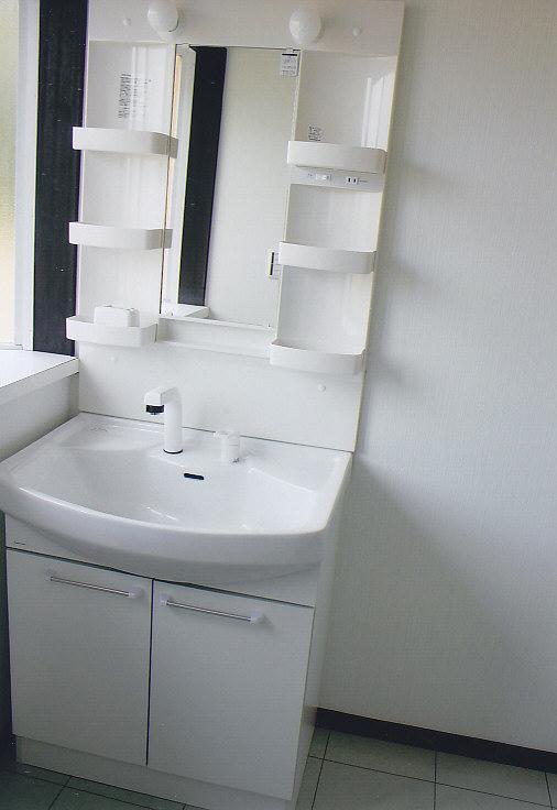 Wash basin, toilet. Spacious wash room of the space