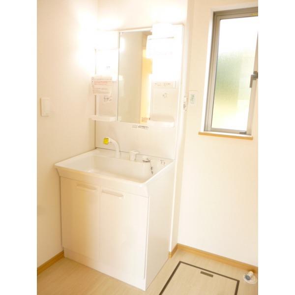 Wash basin, toilet. Washroom