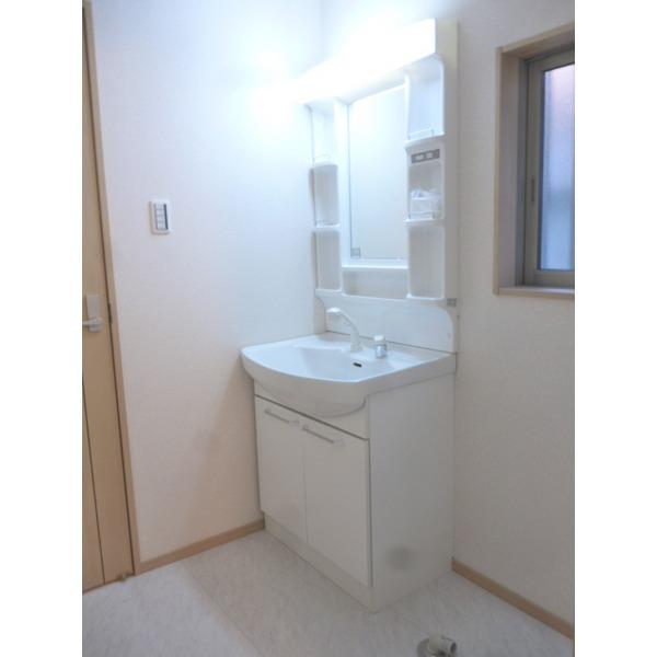 Wash basin, toilet. Washroom