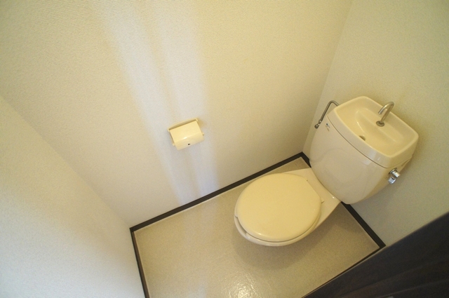 Toilet. Will be 102, Room photos because of floor color may be different