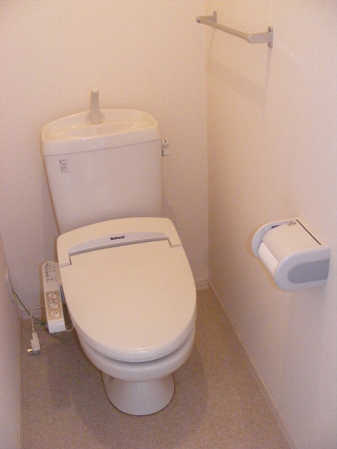 Toilet. Same construction company property photo