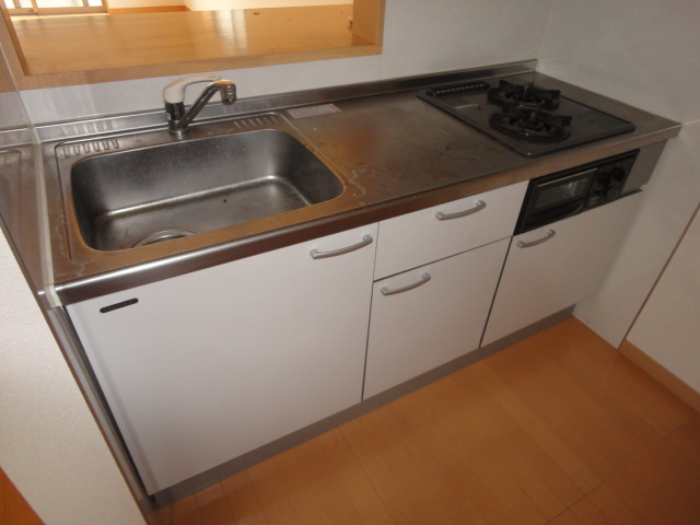 Kitchen. Cooking space also ensure two-burner stove with system Kitchen