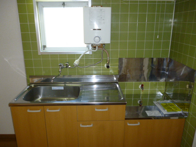 Kitchen. Two-burner stove installation Allowed Kitchen Window with ventilation good