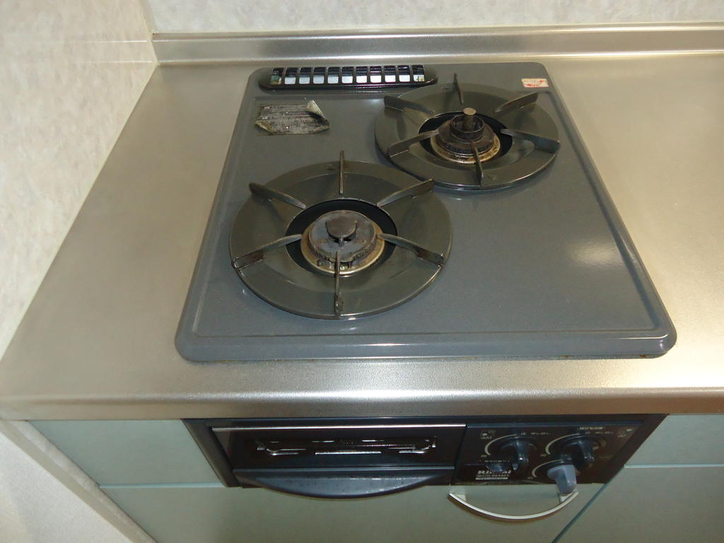 Kitchen. With a two-burner stove grill