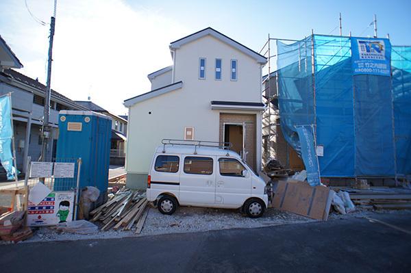 Local photos, including front road. 1 Building