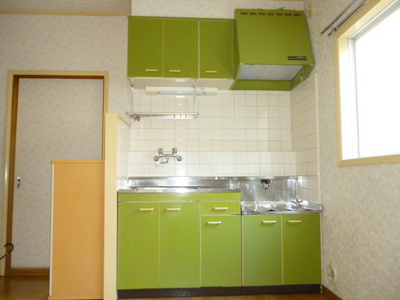 Kitchen. Bright gas stove installed Friendly Kitchen