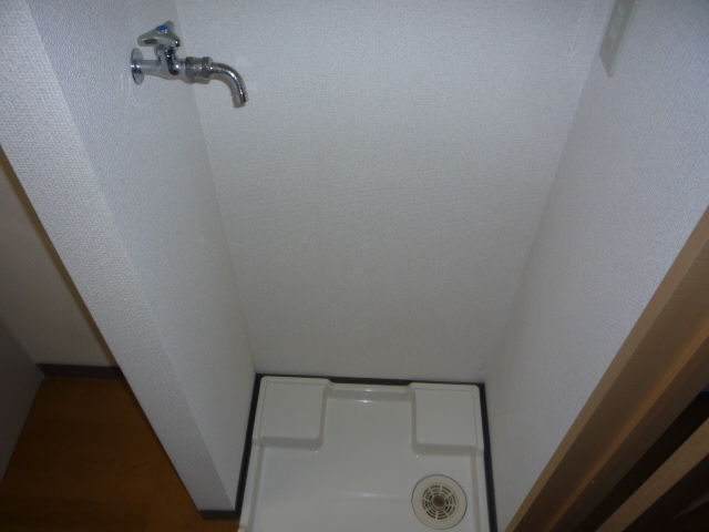 Washroom. With waterproof bread Washing machine in the room