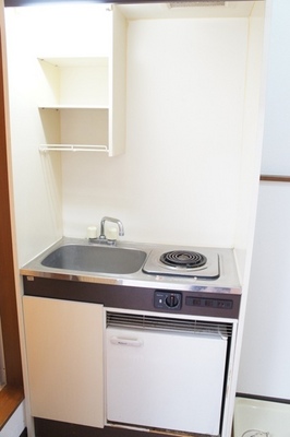 Kitchen. A kitchen with a mini-fridge