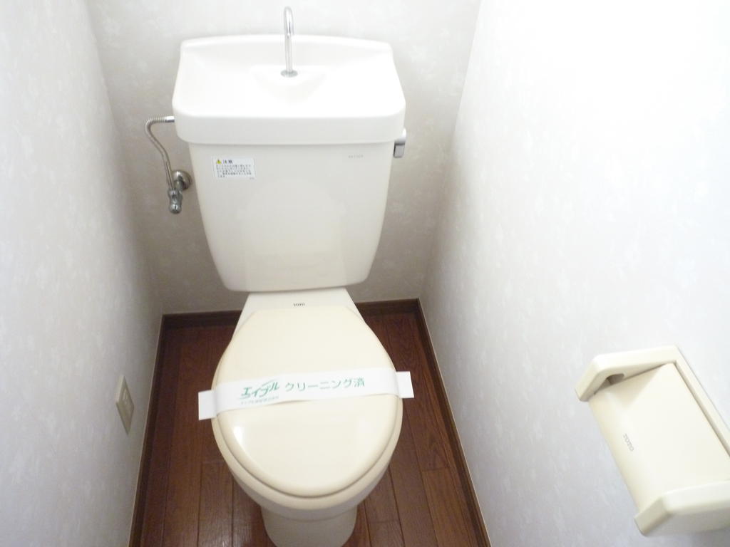 Toilet. It comes with a small window