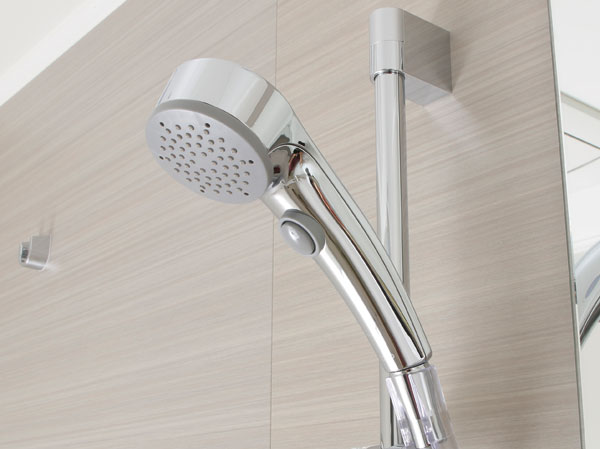 Bathing-wash room.  [Fushiyugata shower head] Frequently it can be waterproof at hand of a button, It increases the Fushiyu effect.