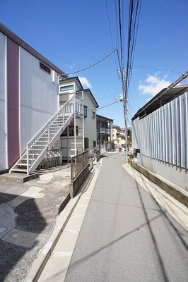 Other. Building before the road has become a downhill.