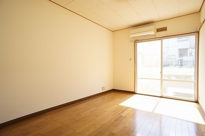 Other room space. Bright indoor light enters.