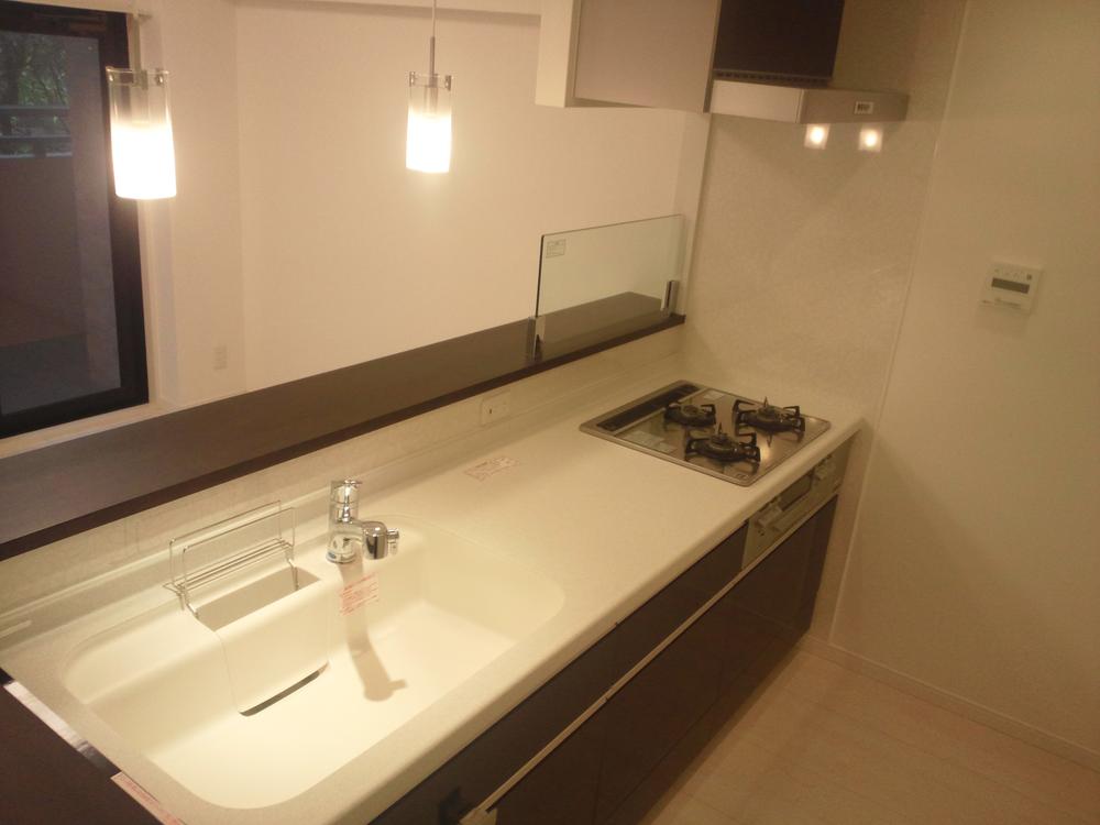 Kitchen. Popular counter kitchen of artificial marble top